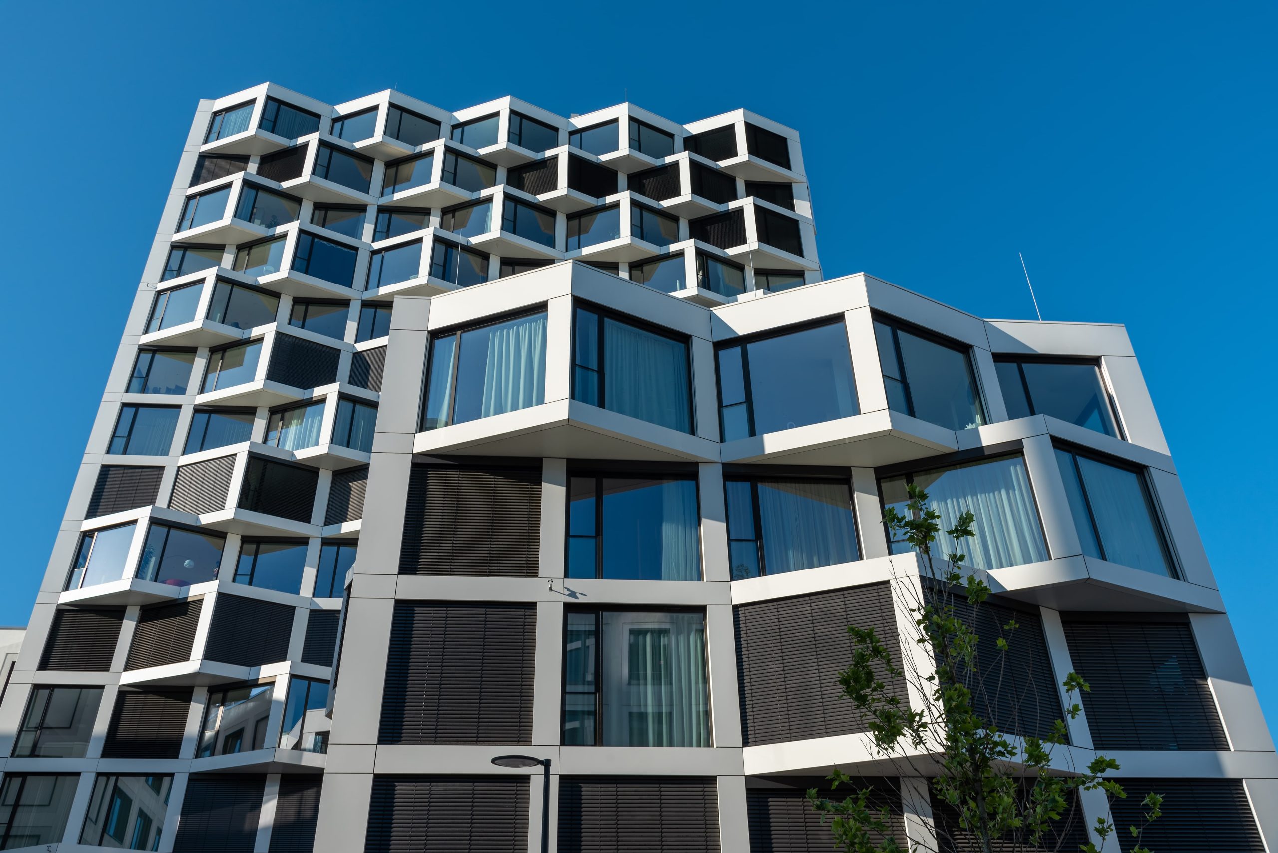 facade of modern high rise residential building 2023 11 27 04 57 29 utc min scaled